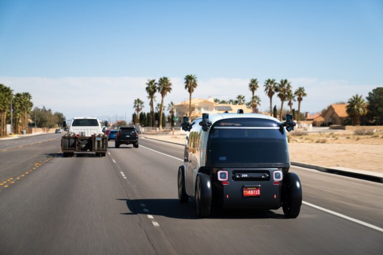 Zoox Robotaxi Driving Down A Road In Las Vegas.jpg
